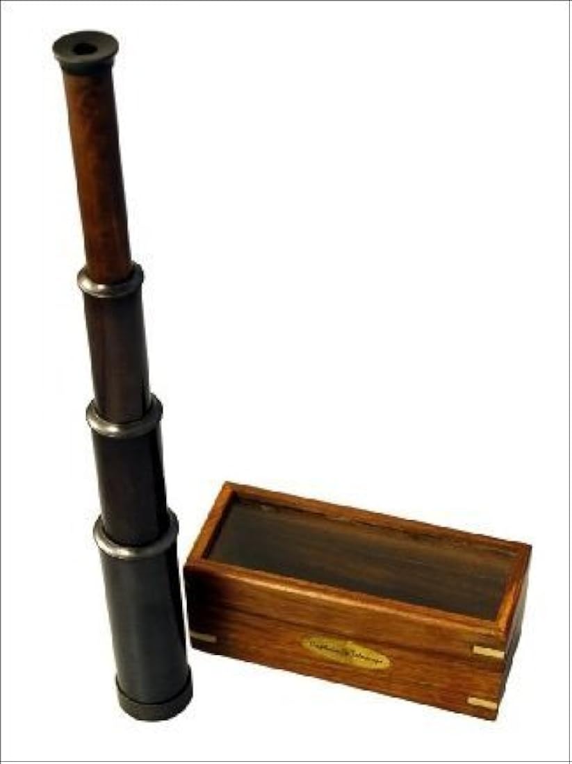 Telescopio de latón envejecido con caja de madera
