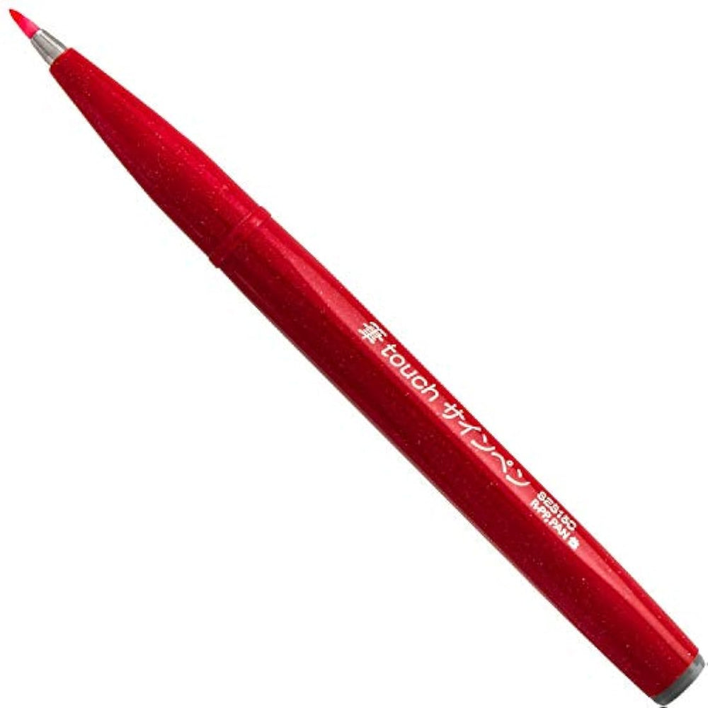 Bolígrafo con punta de pincel Pentel, tinta ocre.