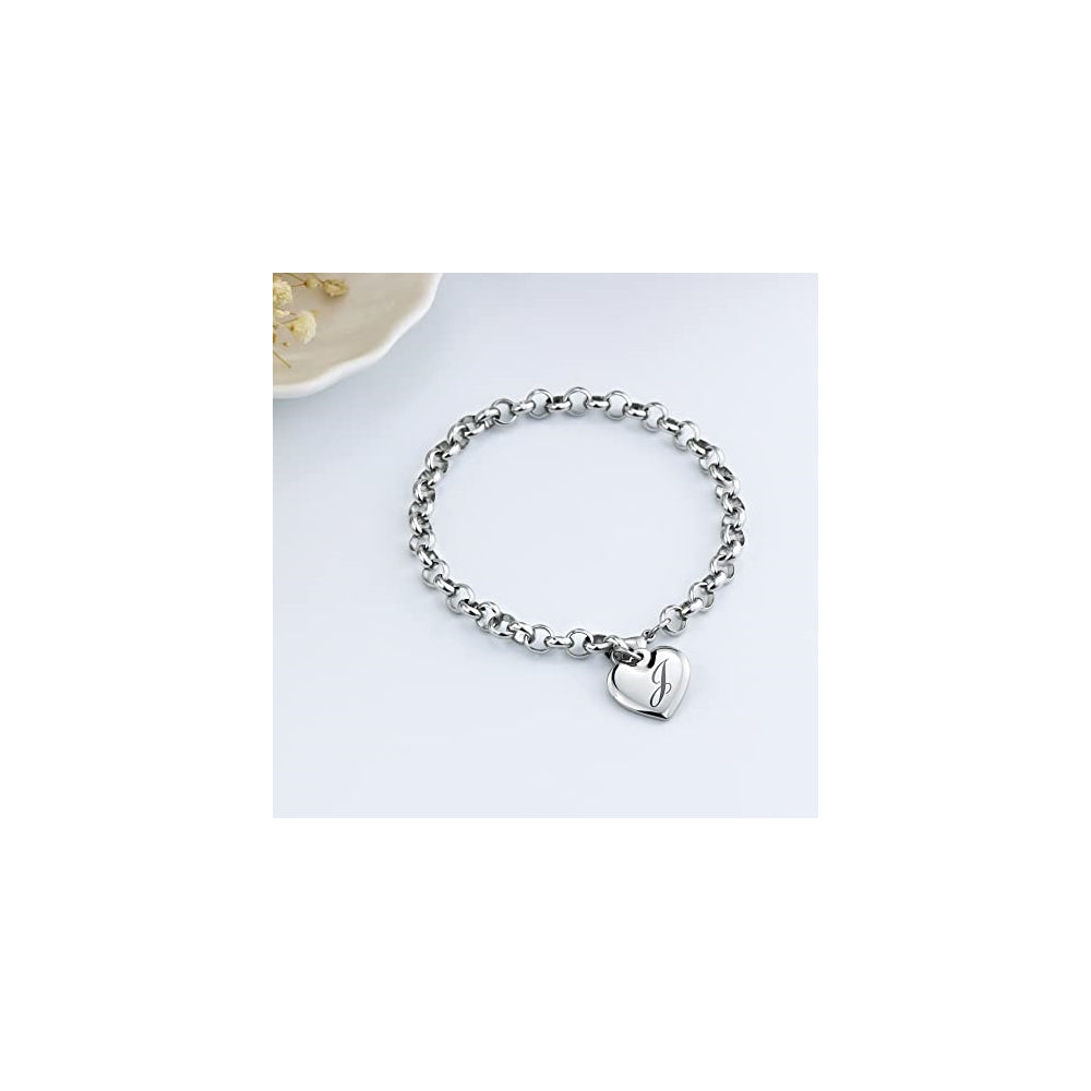 Pulseras de acero inoxidable y dije en forma de corazón