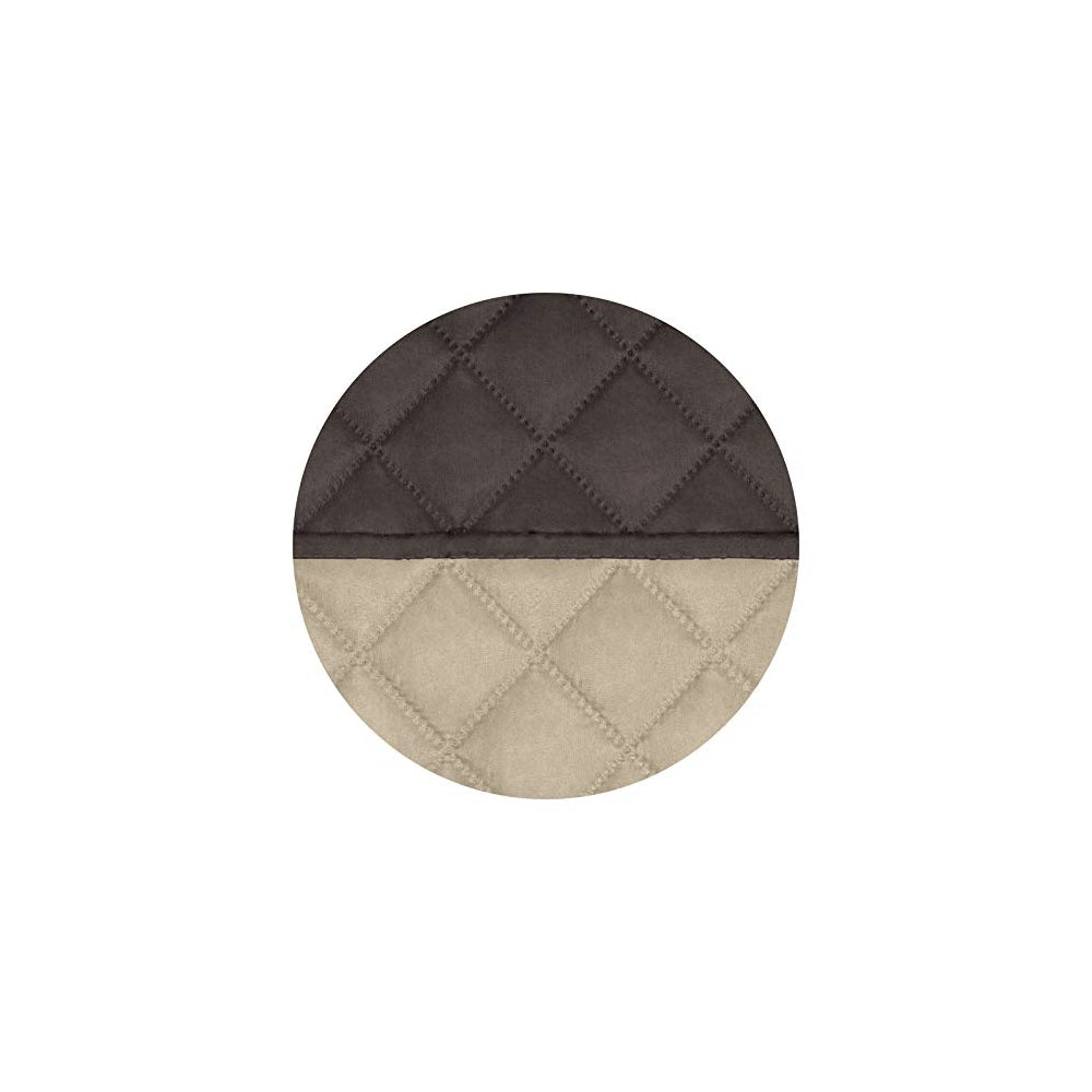 Funda acolchada reversible para sofá con correas elásticas.