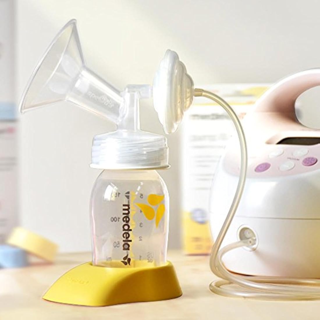 Maymom: Cambiador de rosca de biberón; permite que las bomba