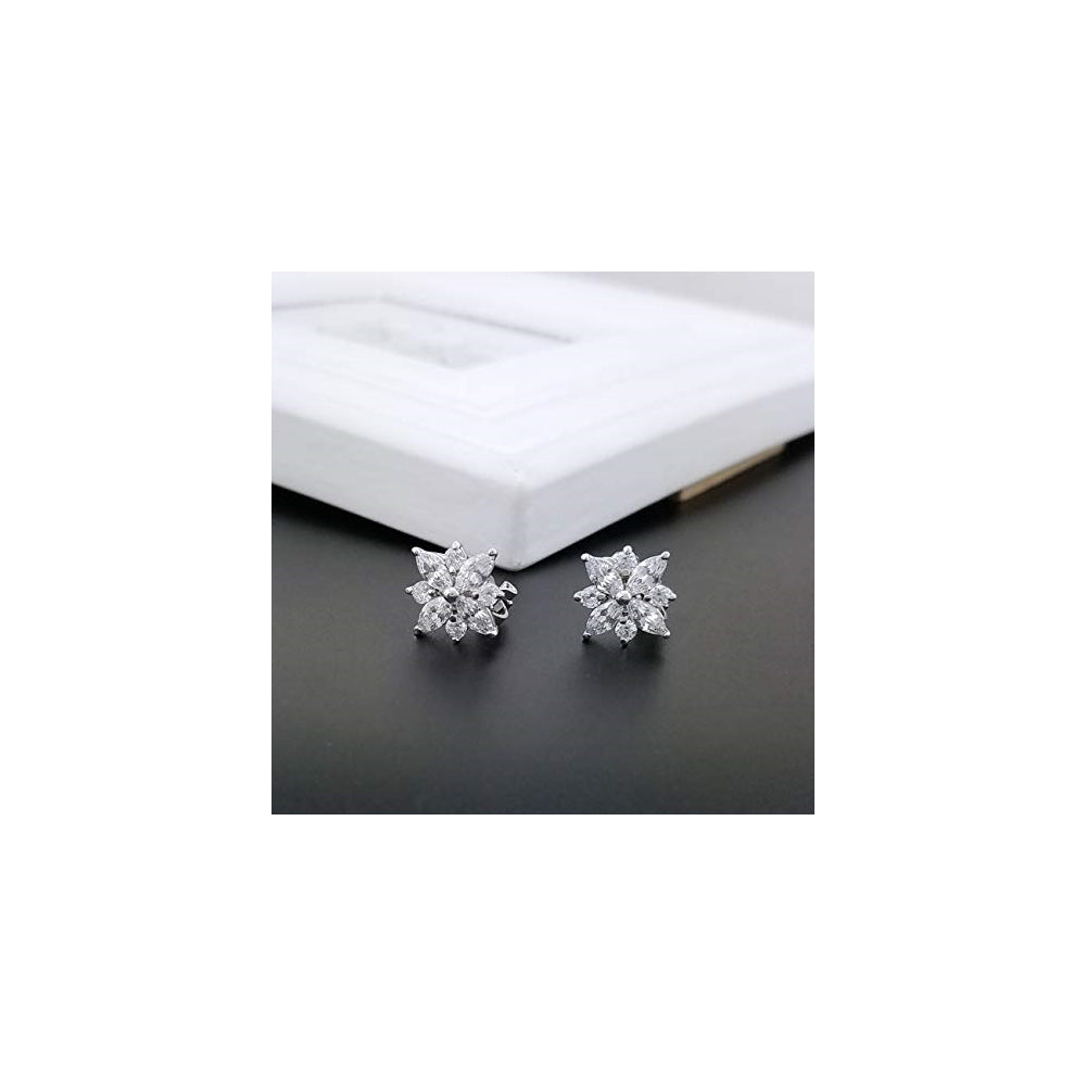 Aretes de clip con forma de copo de nieve para mujeres