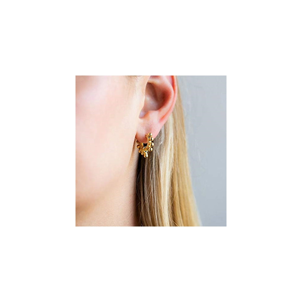 Aretes chapados en oro de 18 quilates con forma de gota