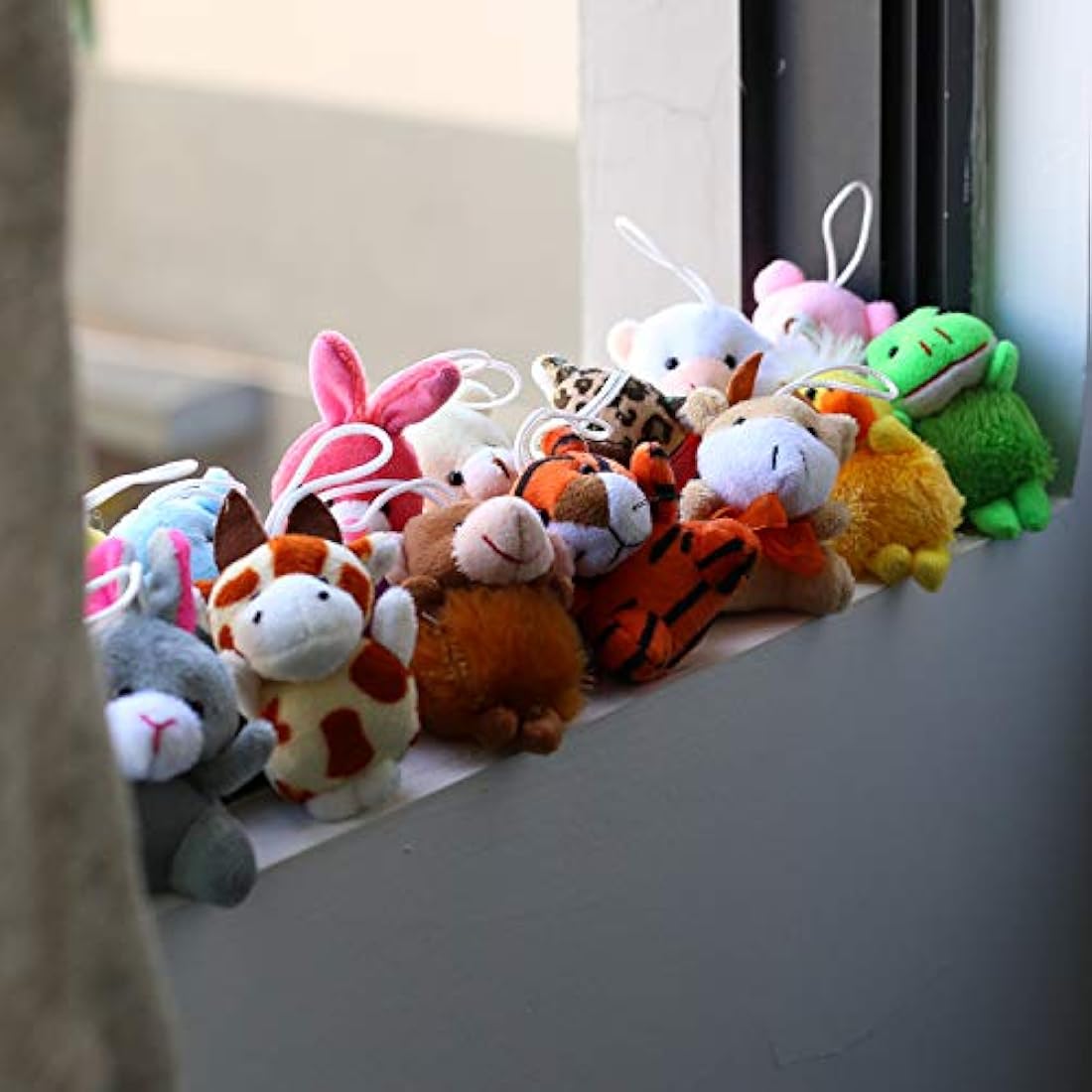 Juego de juguetes de peluche de 28 piezas animales pequeños
