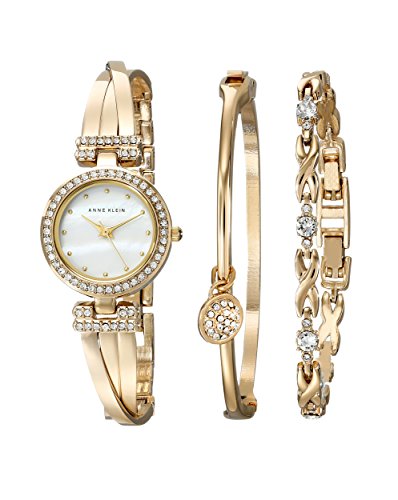 Conjunto de reloj y brazalete en tono dorado para mujer