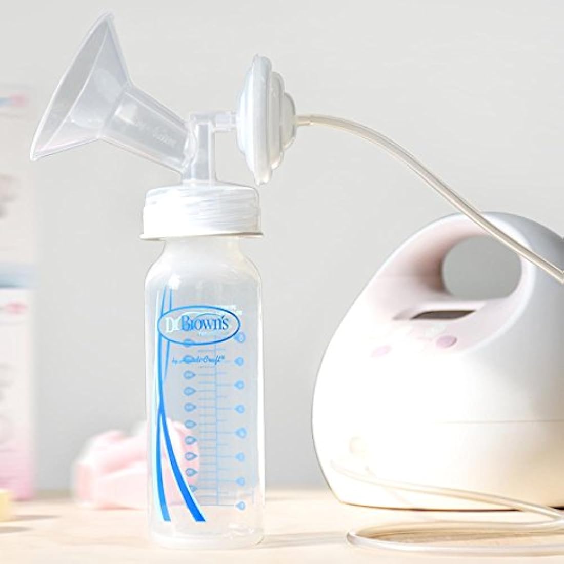 Maymom: Cambiador de rosca de biberón; permite que las bomba