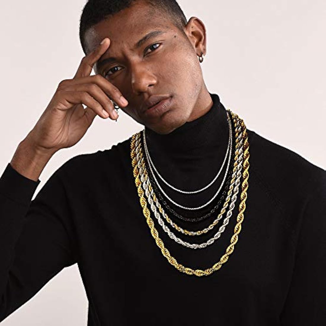 Cadena trenzada de acero inoxidable con bañado en oro 18 K