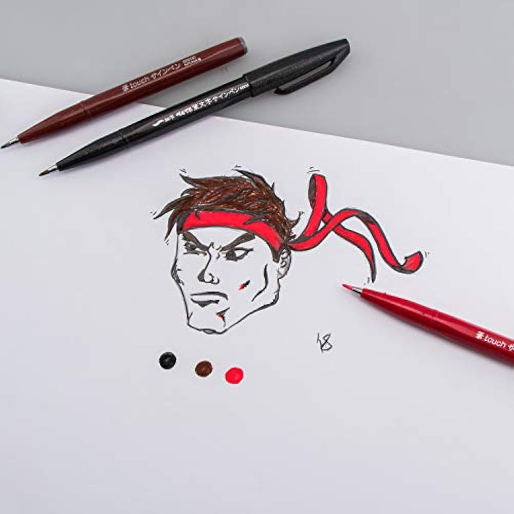 Bolígrafo con punta de pincel Pentel, tinta ocre.