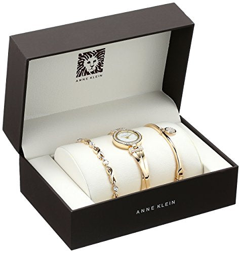 Conjunto de reloj y brazalete en tono dorado para mujer