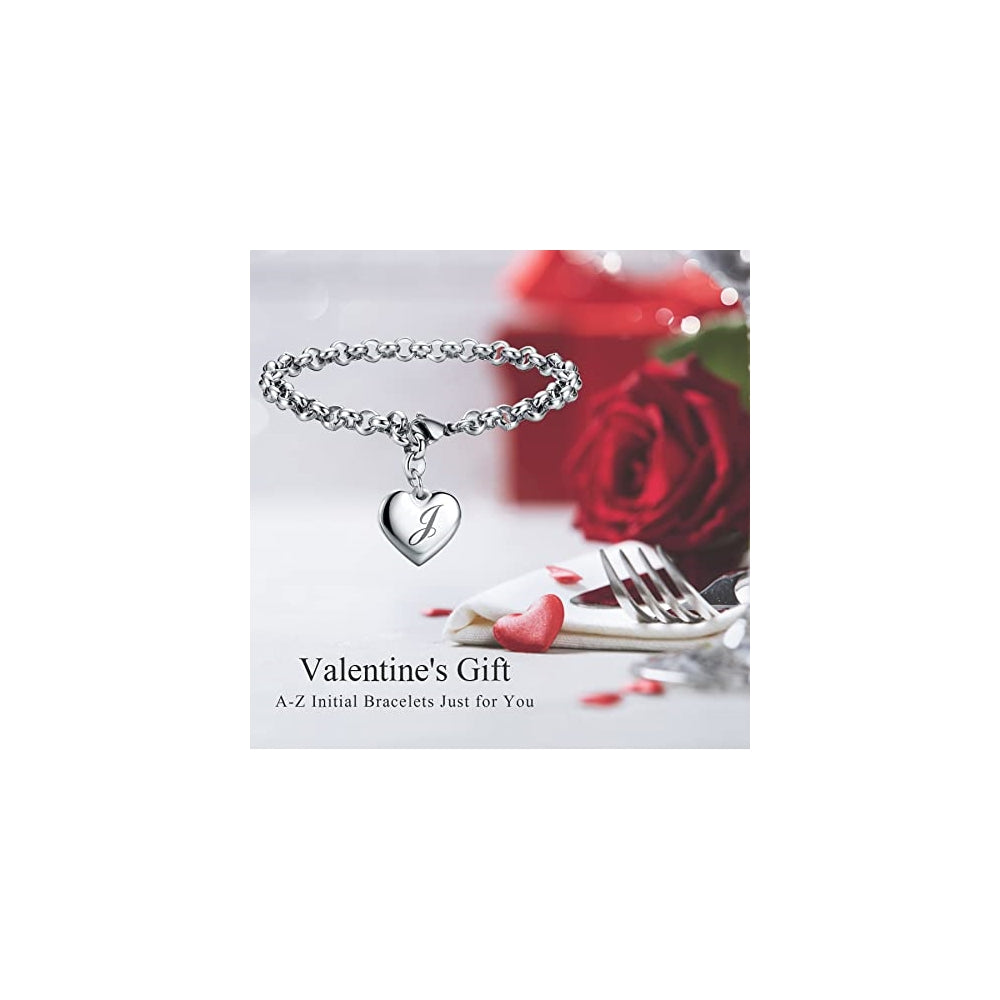 Pulseras de acero inoxidable y dije en forma de corazón