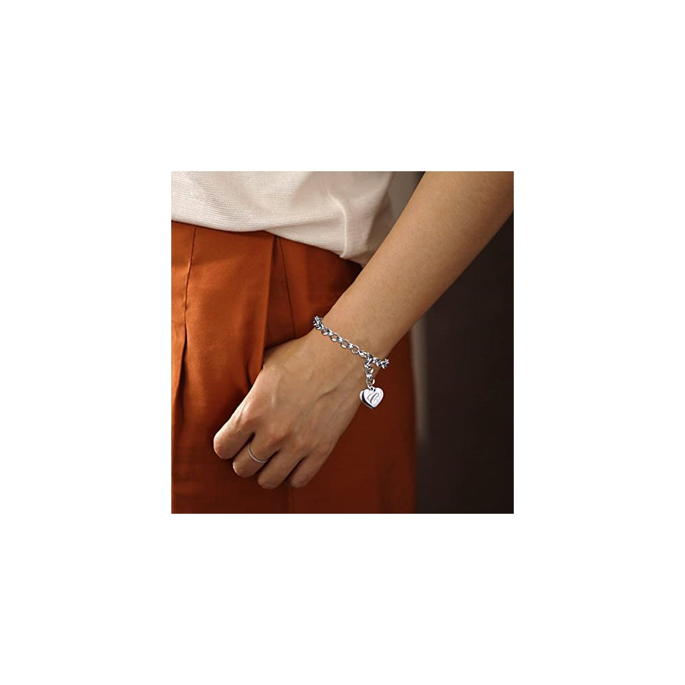 Pulseras de acero inoxidable y dije en forma de corazón