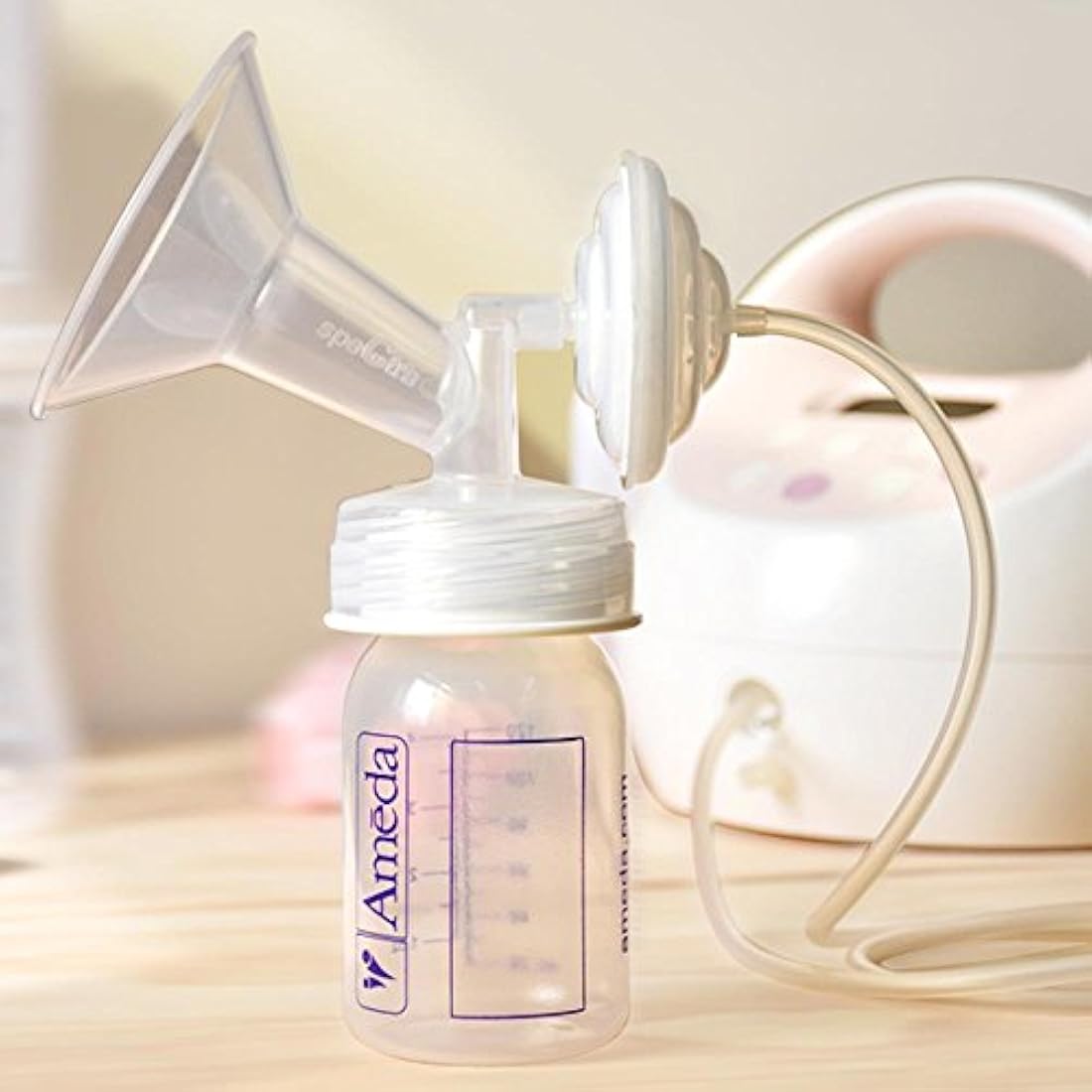 Maymom: Cambiador de rosca de biberón; permite que las bomba