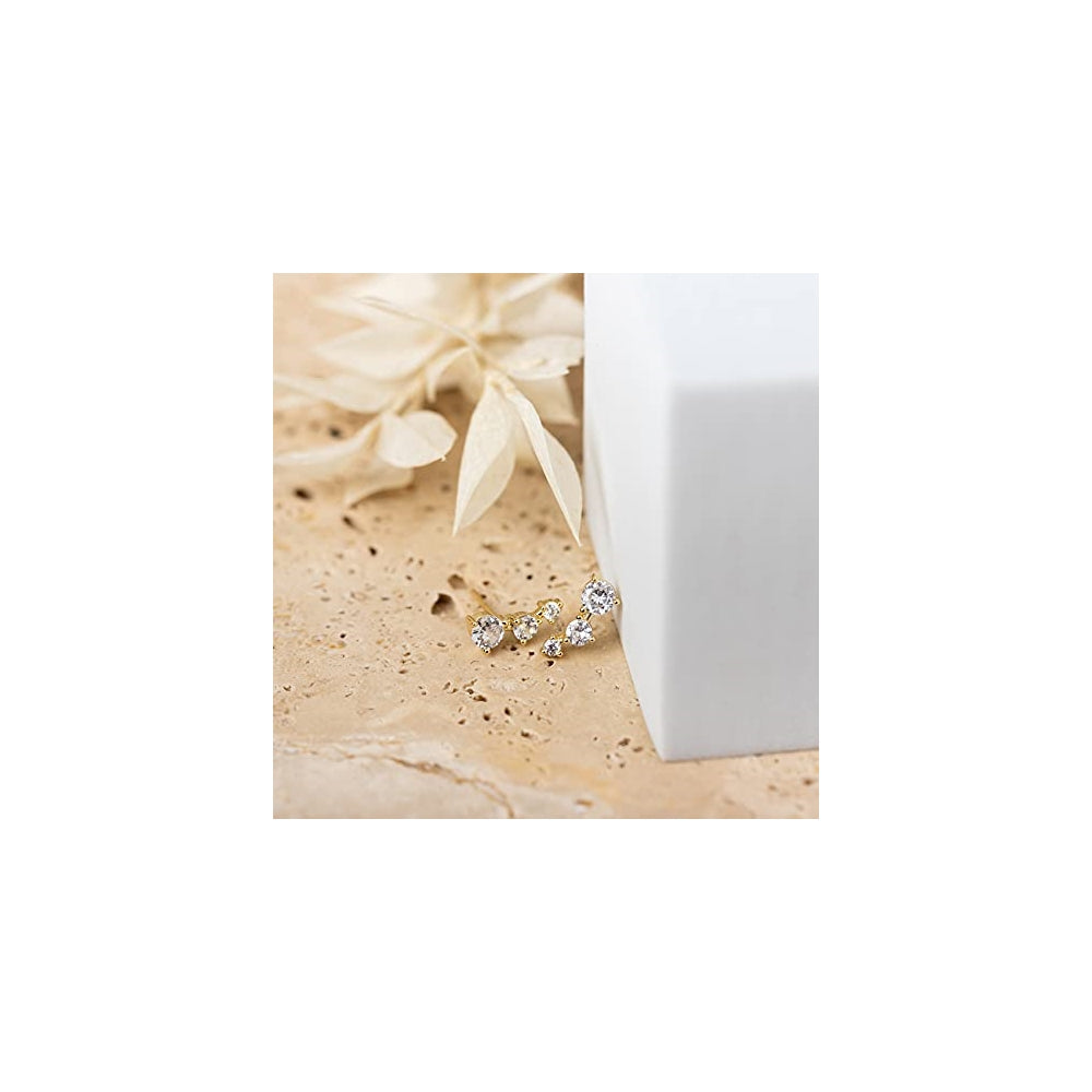 Aretes de plata en oro de 14 quilates con circonita