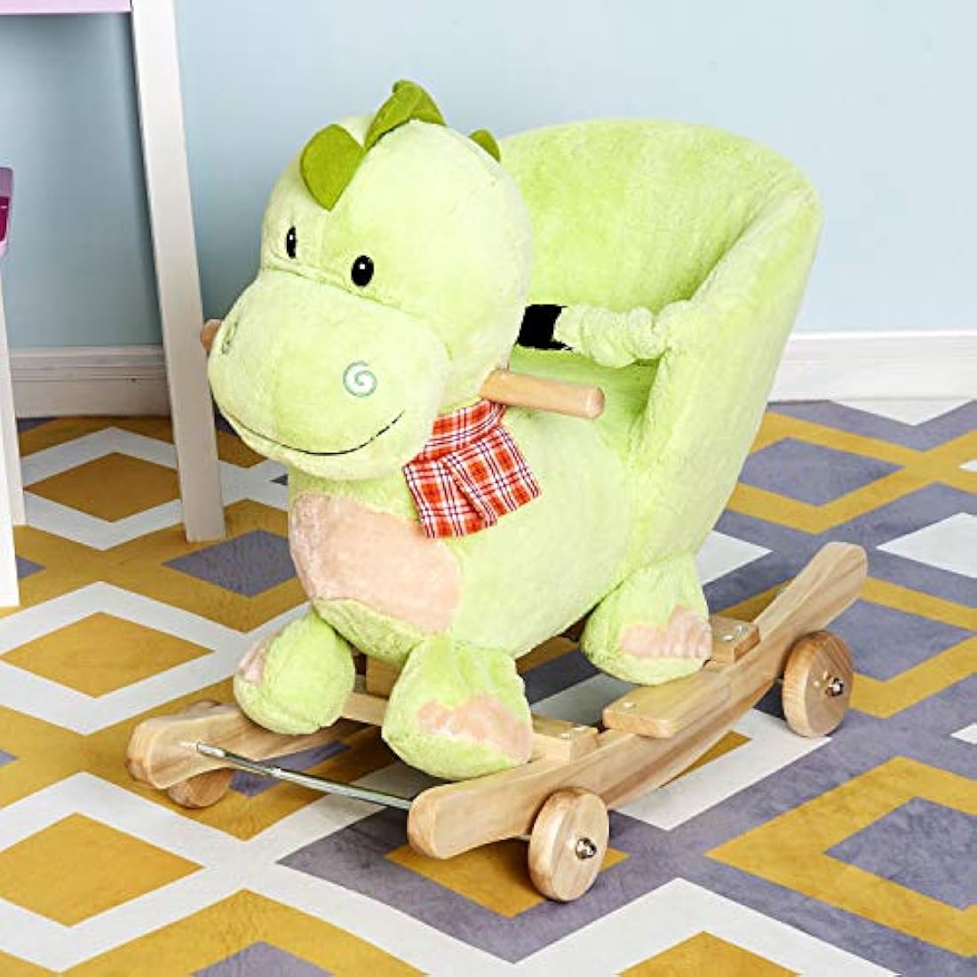 Cochecito de peluche con dinosaurio balancín