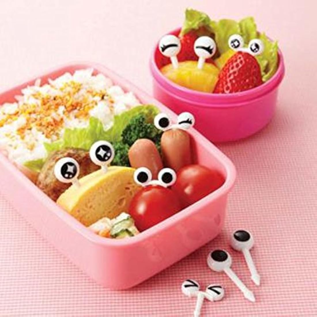 Agarrador CutezCute en forma de ojos para recoger la comida