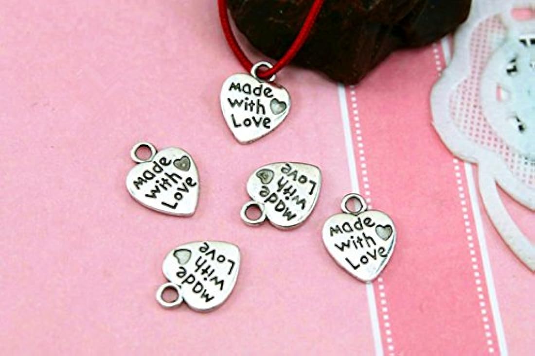 Dije con diseño de huella de perro