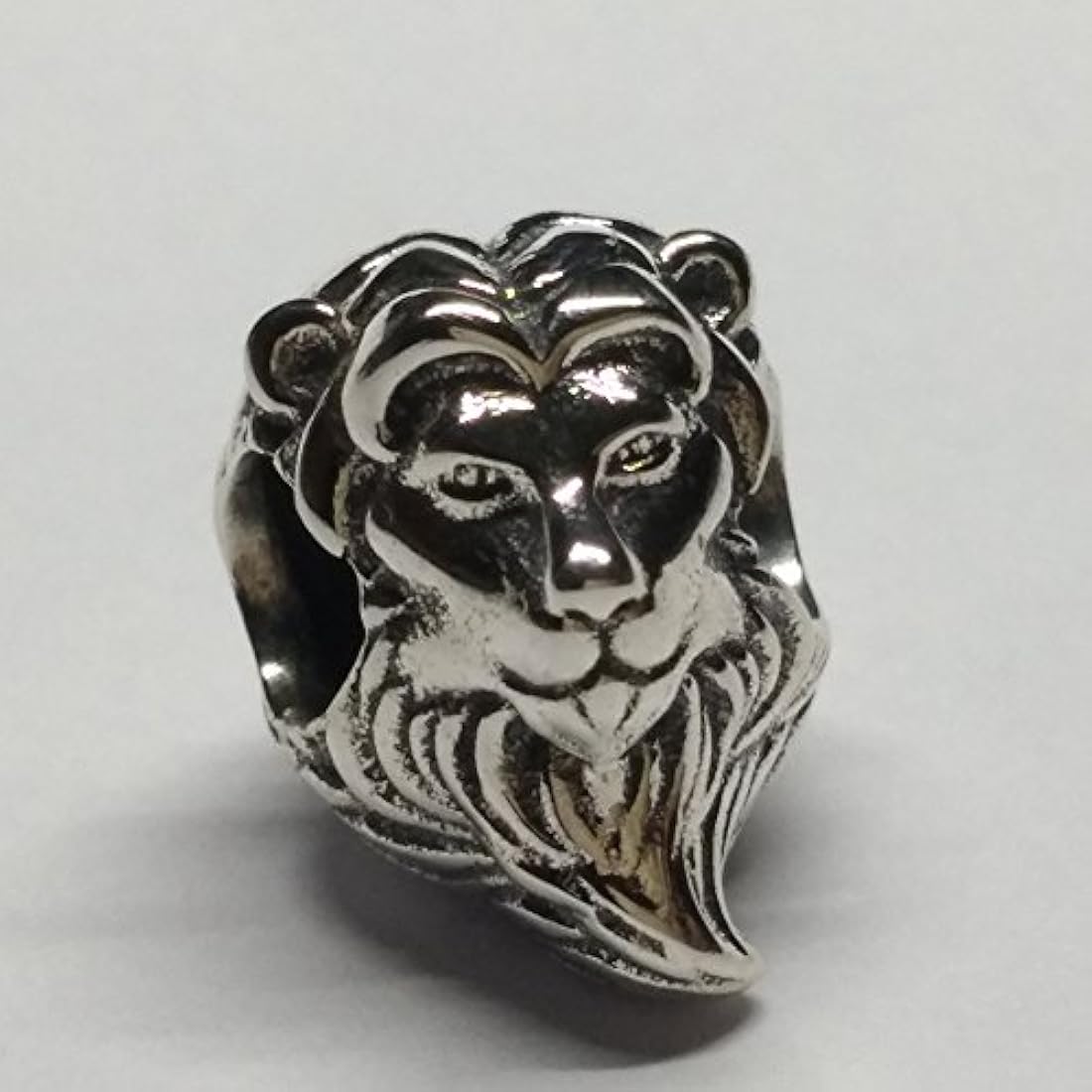 Dijes y Medallas Abalorio de león de plata