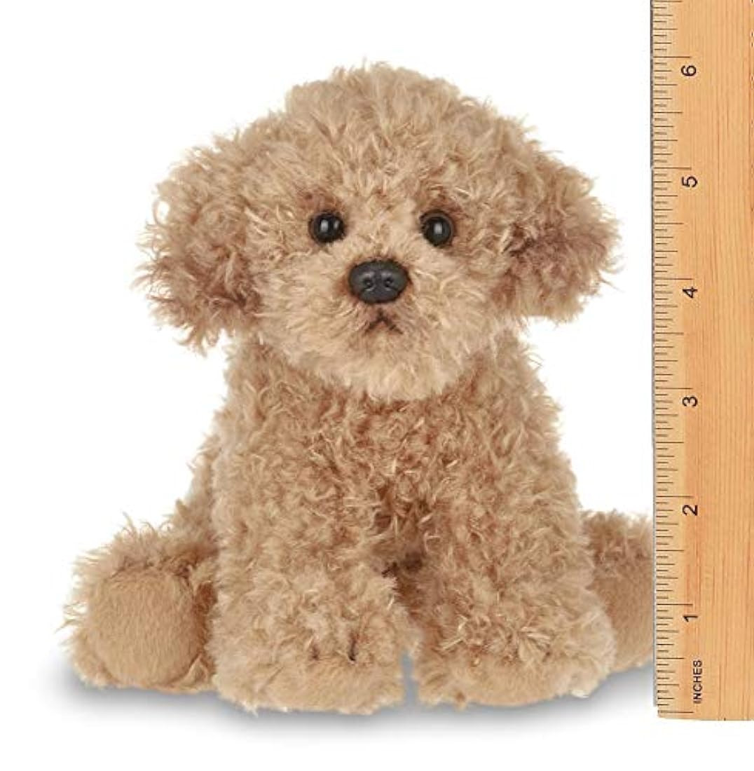 Perro pequeño de peluche