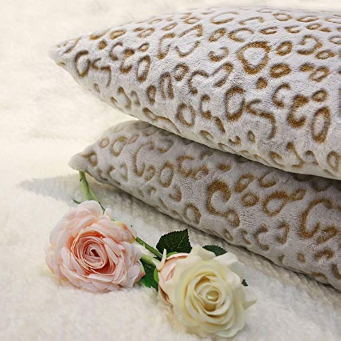 Juego de 2 fundas de almohada de felpa.