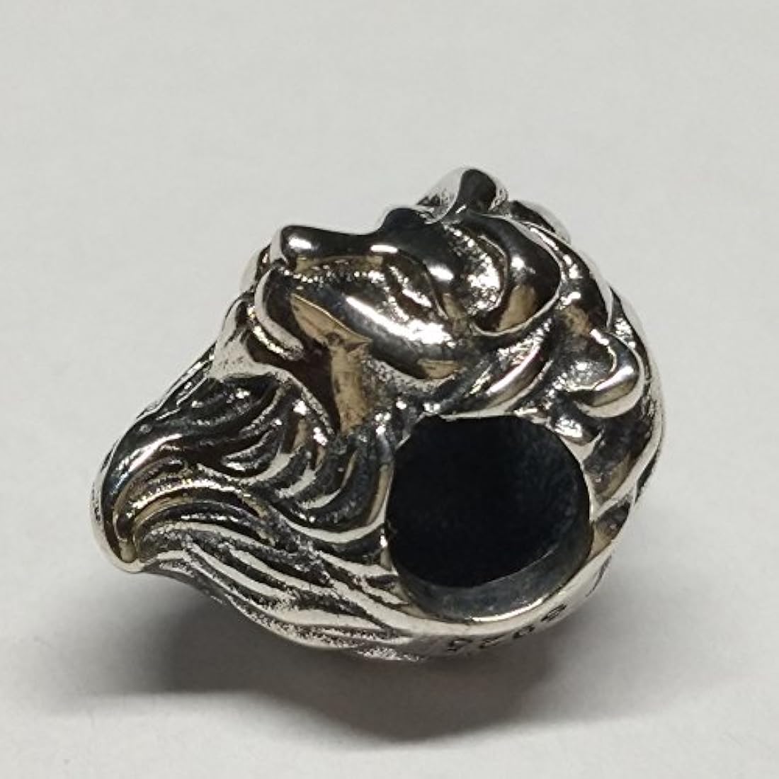 Dijes y Medallas Abalorio de león de plata