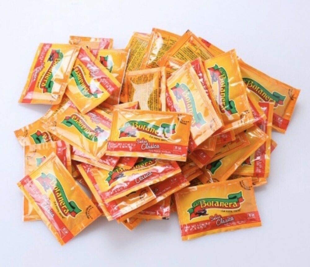 50 Paquetes de Salsa Botanera Clásica Picante 10g cada uno