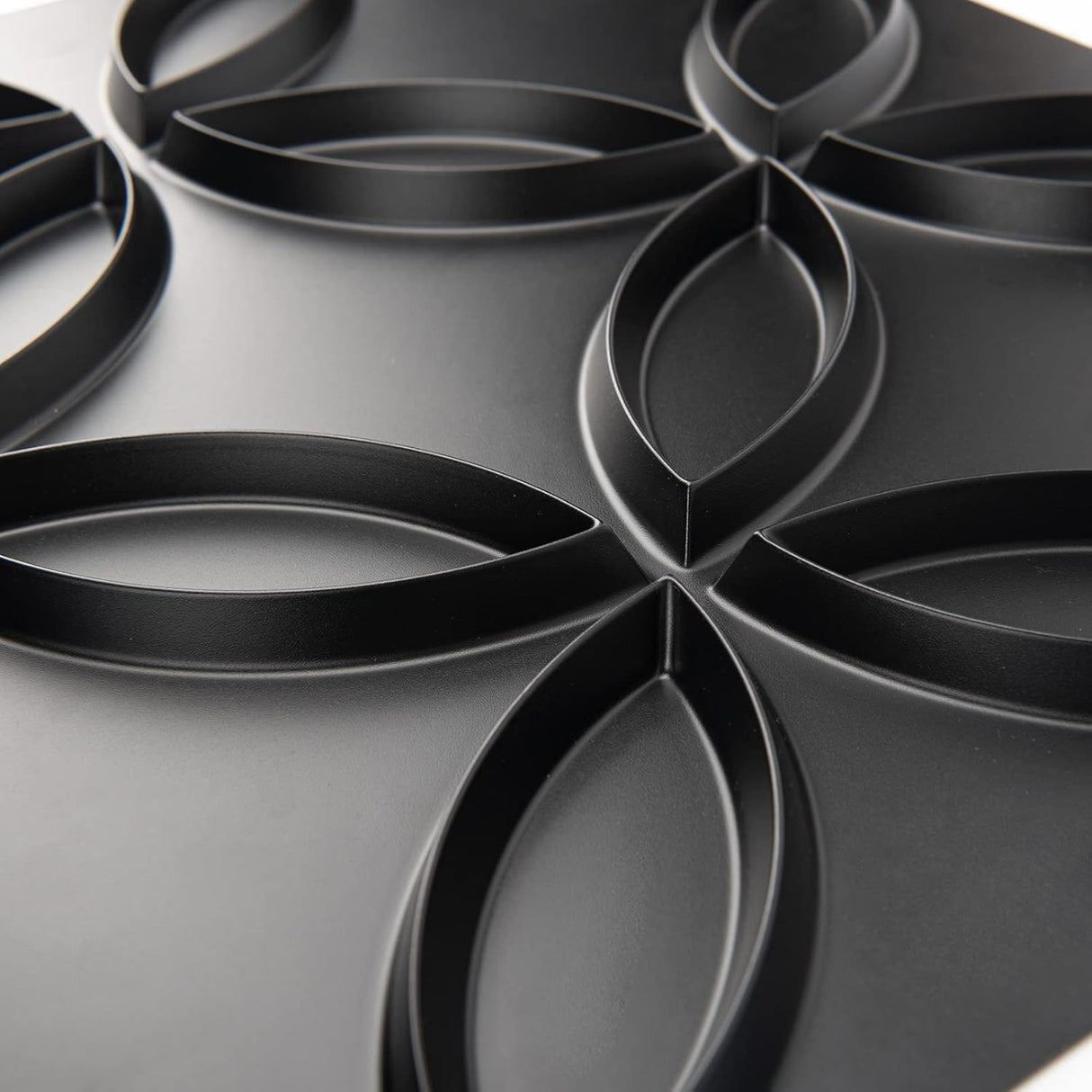 Panel de pared 3D de PVC con círculos entrelazados en negro