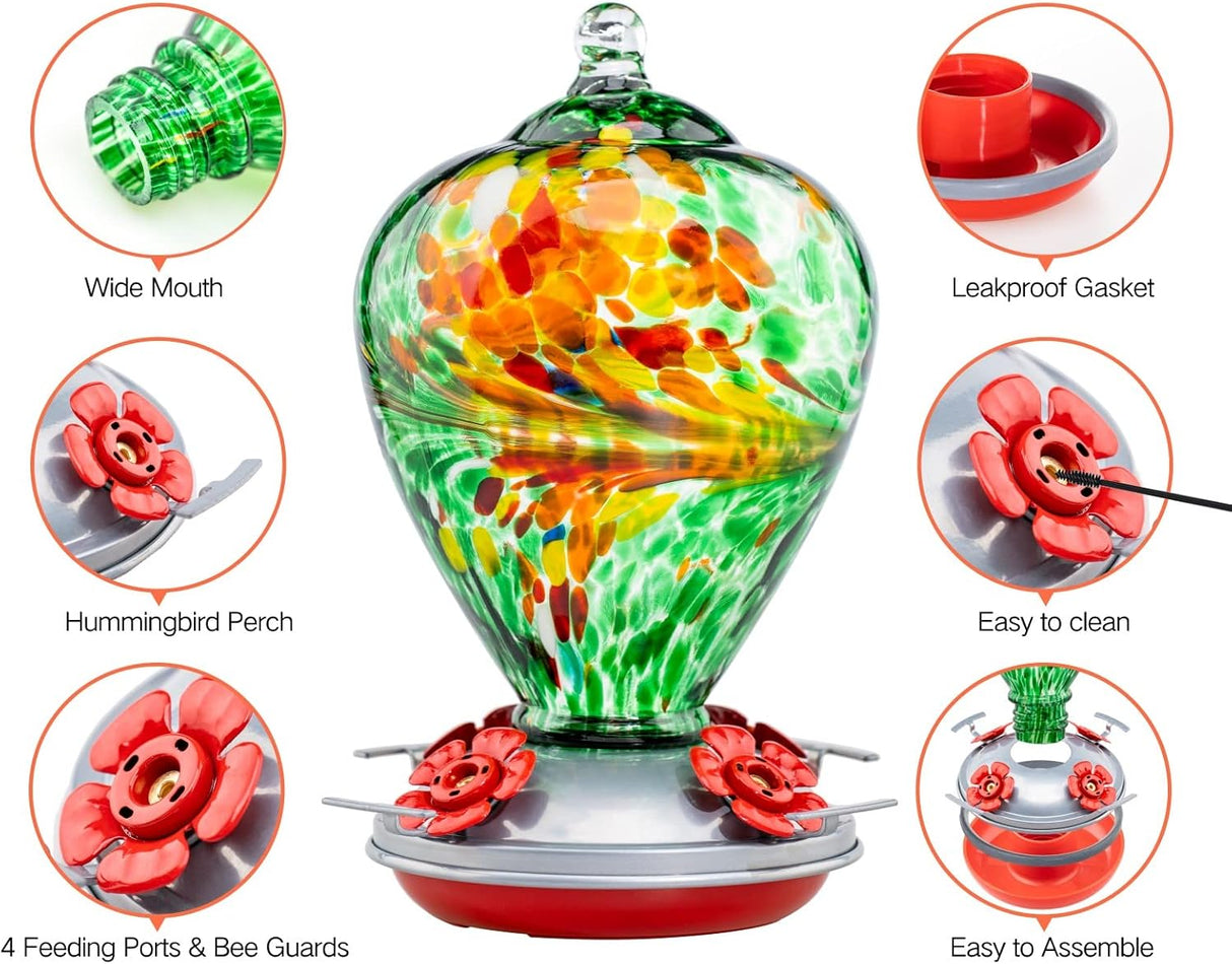 Muse Garden - Comedero para colibríes para exteriores vidrio soplado a mano, 34 onzas, foso de hormigas incluido, Peacock