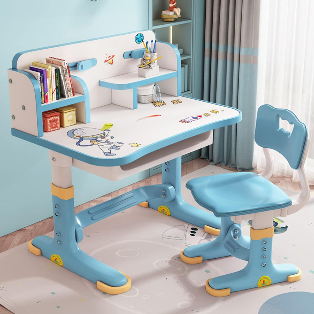 Escritorio y silla ajustables para niños con cajón y patrón.