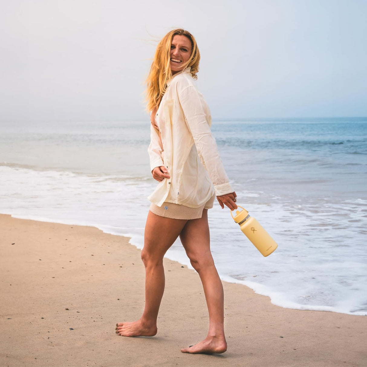 Botella de agua HYDRO FLASK, acero inoxidable, tapa con popote.