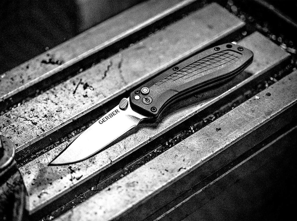 Cuchillo de transporte diario con apertura asistida