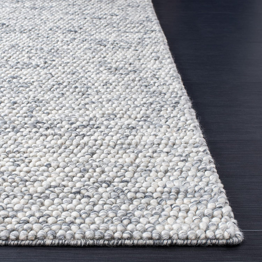 Alfombra de área hecha a mano, ideal para zonas de alto tráfico