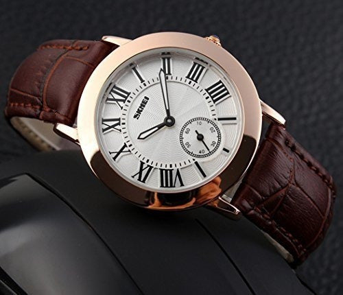 Reloj de pulsera de oro rosa con correa de cuero marrón