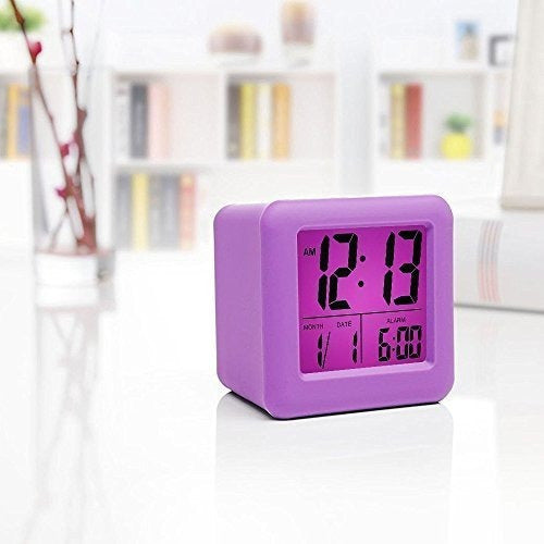 Reloj de viaje con repetición y luz nocturna púrpura