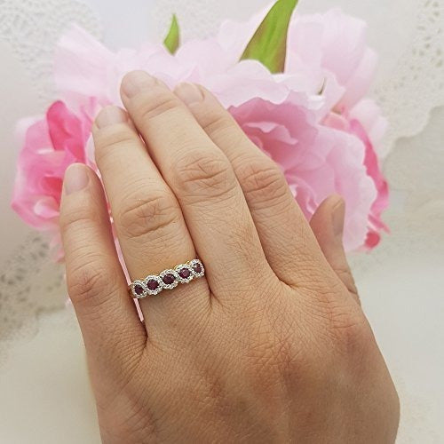 Anillo de oro de 10k con diamantes y rubi