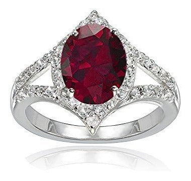 Anillo de vástago dividido de moda ovalado de rubí y topacio