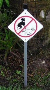 letrero de prohibicion de defecar los perros