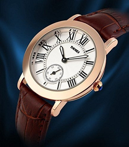 Reloj de pulsera de oro rosa con correa de cuero marrón