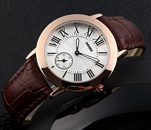 Reloj de pulsera de oro rosa con correa de cuero marrón