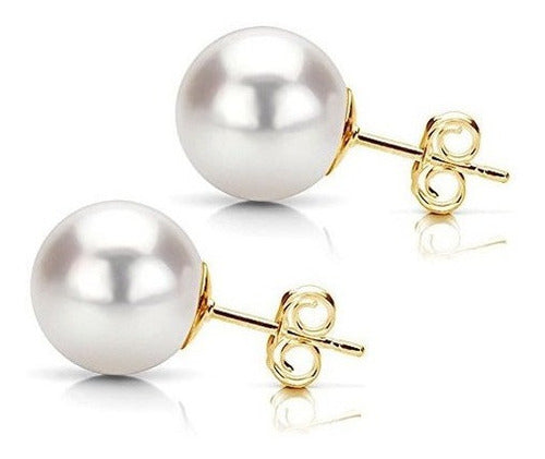 Conjunto de collar y pendientes de perlas y oro