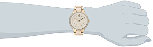 Reloj de resina dorada y marfil Anne Klein para mujer