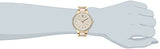 Reloj de resina dorada y marfil Anne Klein para mujer