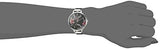 Reloj para mujer con correa plateada y negra.