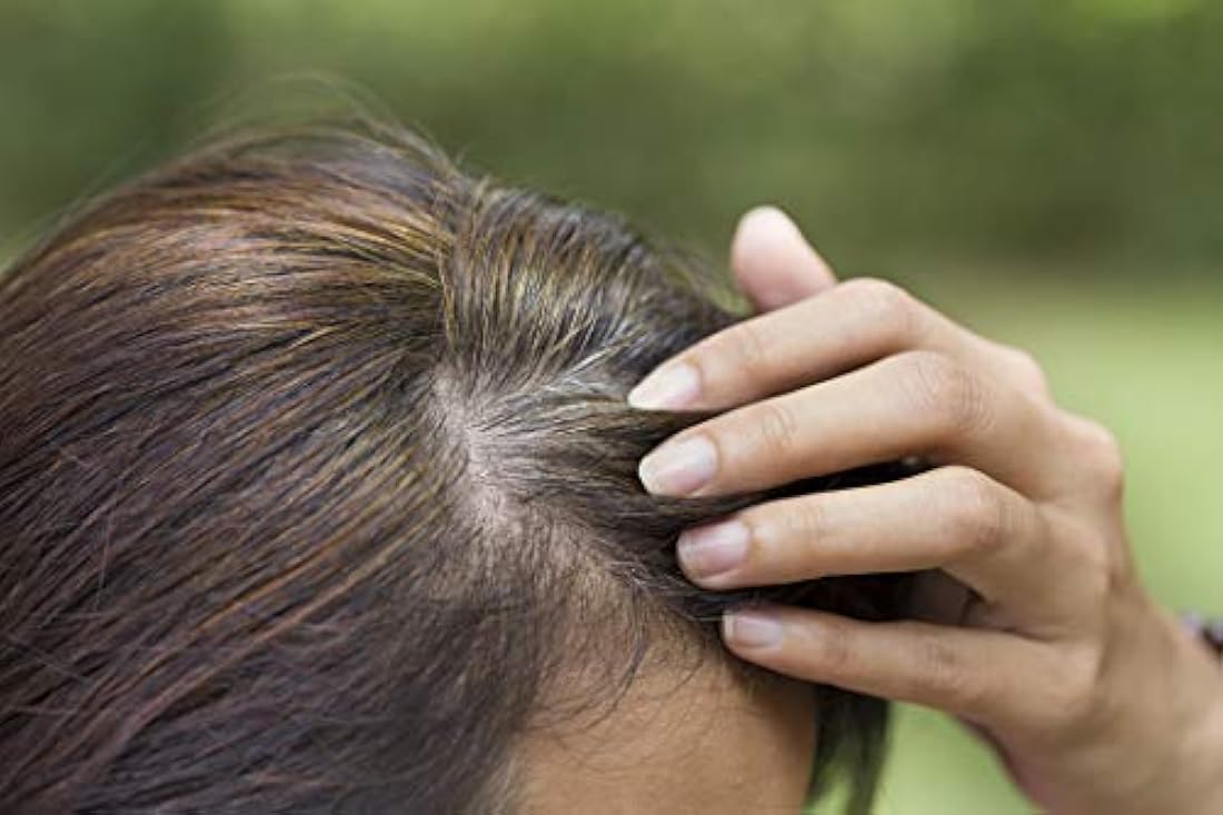 Suplemento de crecimiento de cabello con biotina