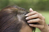 Suplemento de crecimiento de cabello con biotina
