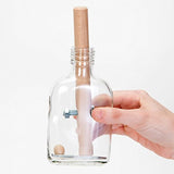 Puzle con frustración en botella -  Bits and Pieces