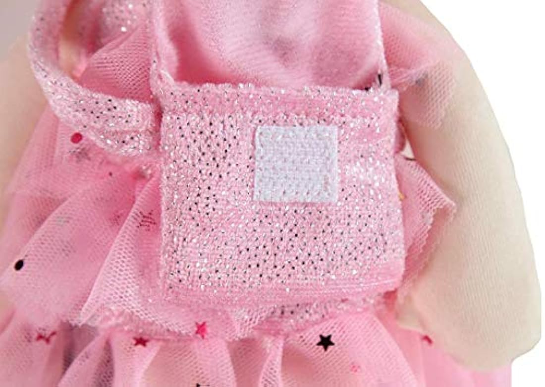 Muñeca de peluche con diente de princesa rosa