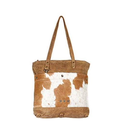 Bolso de piel de vaca color marrón. Marca Myra Bag