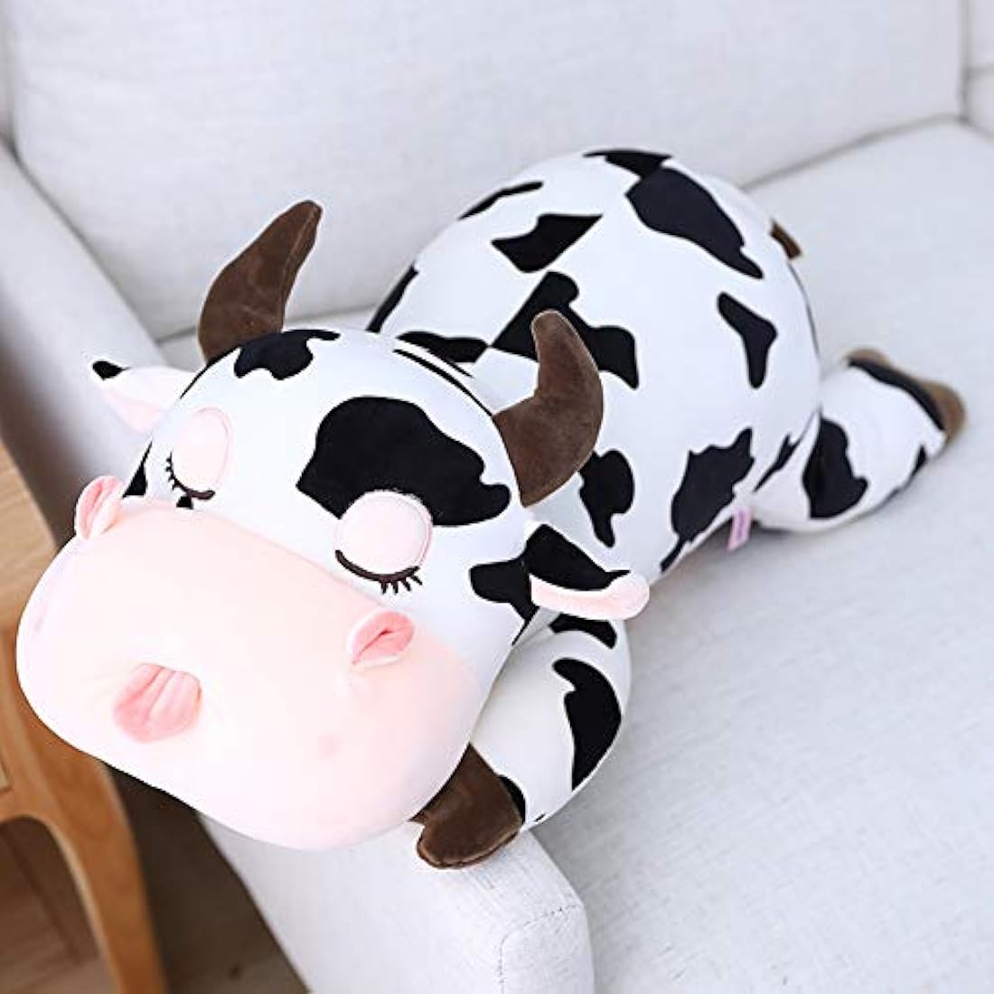suave almohada de vaca peluche