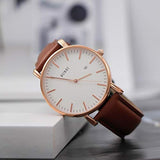 Reloj de pulsera analógico en cuarzo, correa de piel