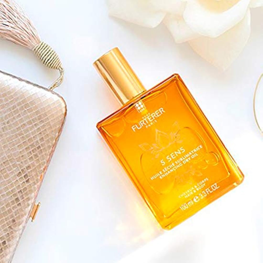 Aceite seco para mejorar el cabello y la piel multiusos